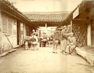 [Photo.22/(019)] Chinese barbers at work in a courtyard