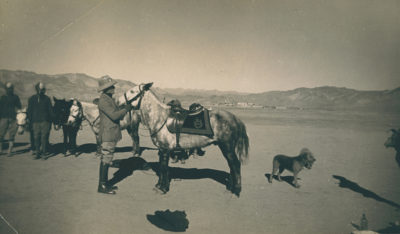 [Photo.86/2(019)] Fleming Mackenzie with his horse Sassa preparing for a game of polo, Gyantse, December 1938