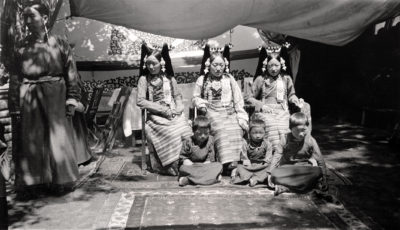 [Photo.86/2(060)] The Duchess of Lhasa and her daughters in full ceremonial costume, 1938