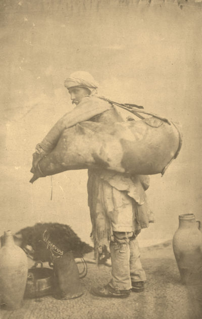 [Photo.33/(001)] Studio portrait of a water carrier